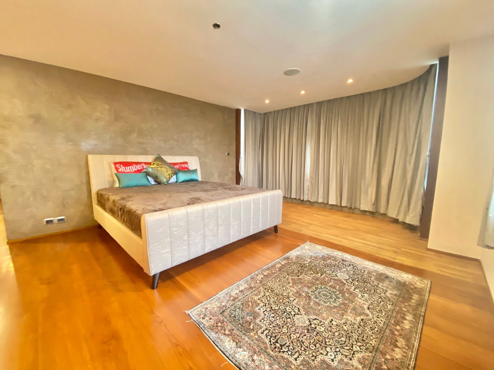 Master bedroom with wood floor