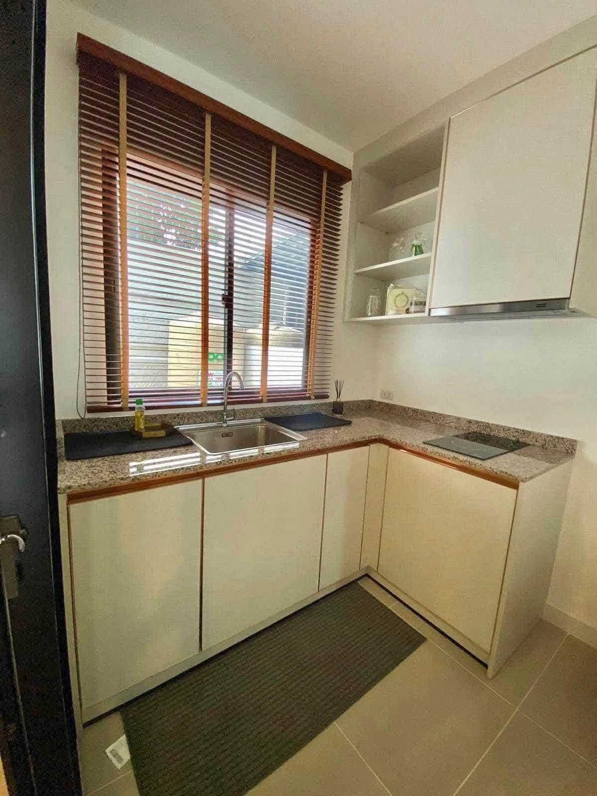 Kitchen with cabinets and sink