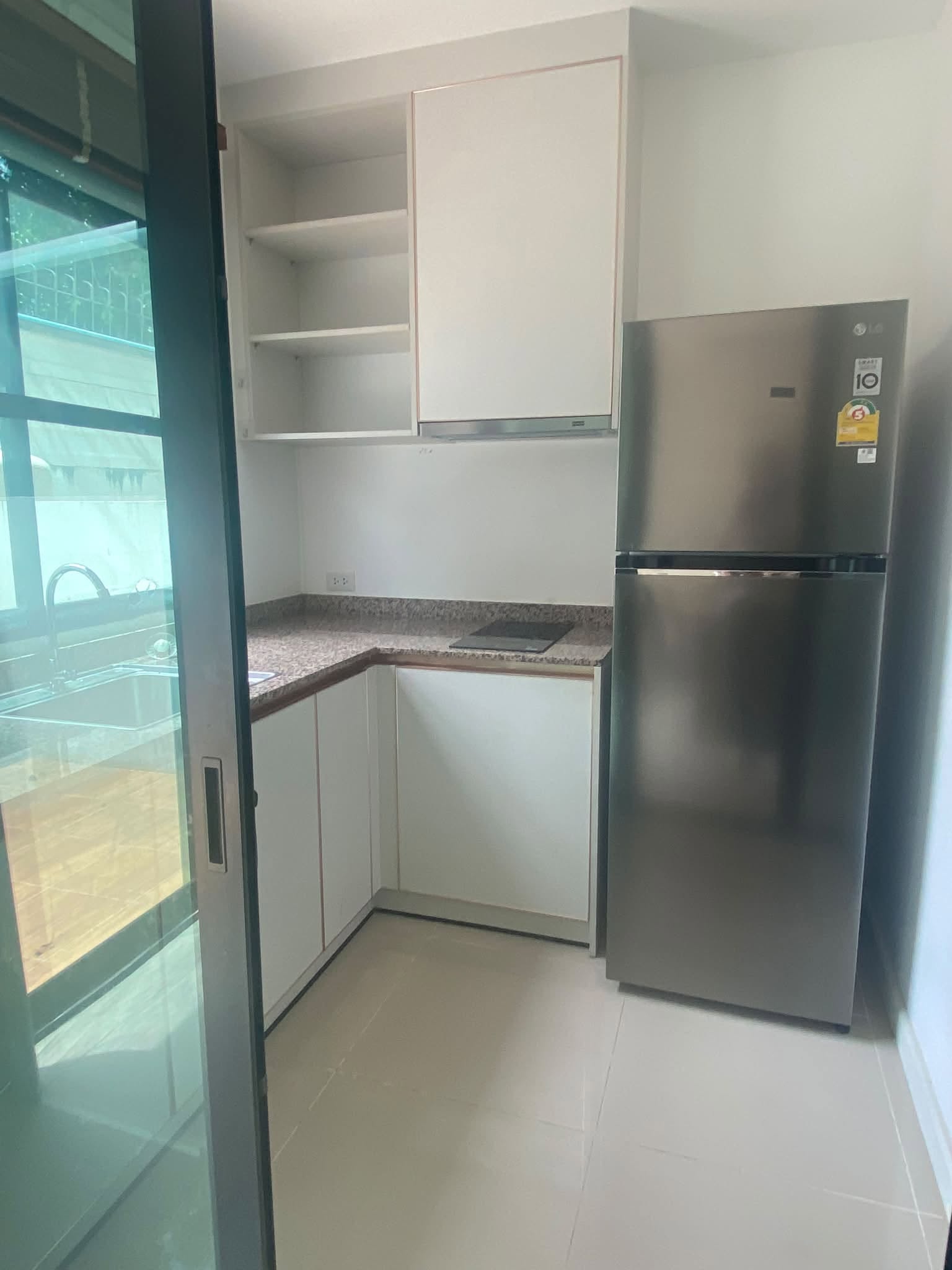 Kitchen with fridge