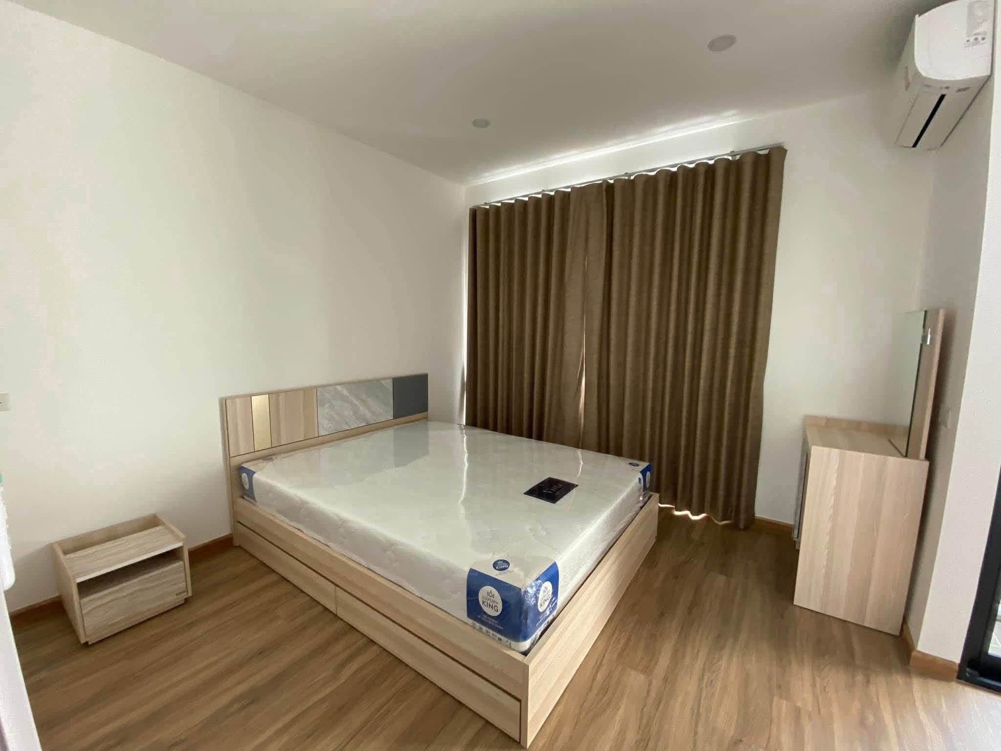 Bedroom with bed and air conditioner