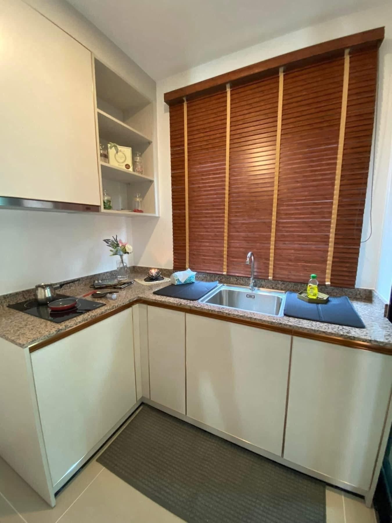 Kitchen with cabinets and sink