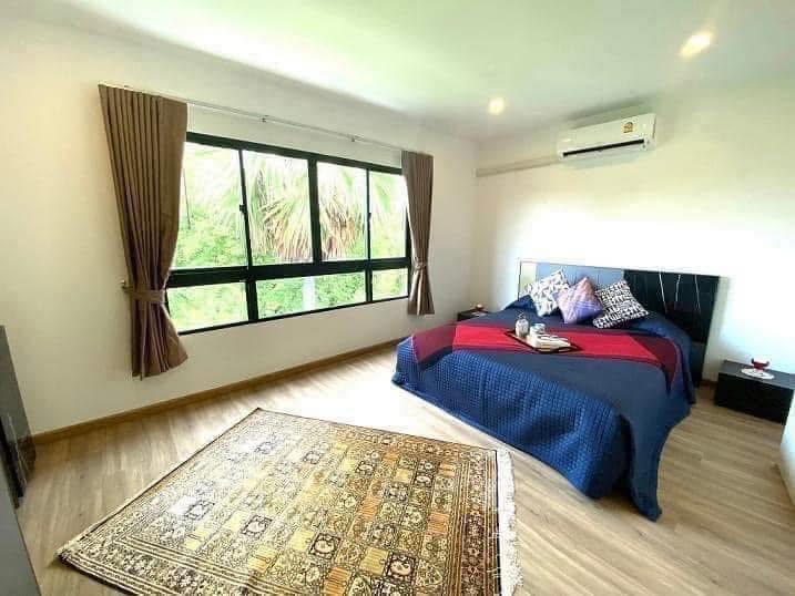 Bedroom with bed and air conditioner