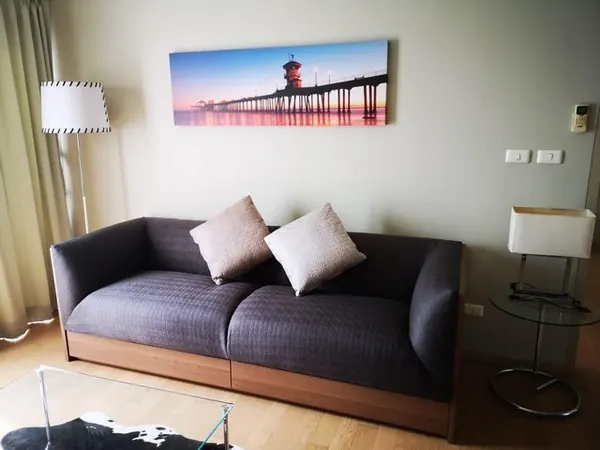 Living room of the 1-bedroom condo (48 sq.m.) at Noble Reveal Ekamai