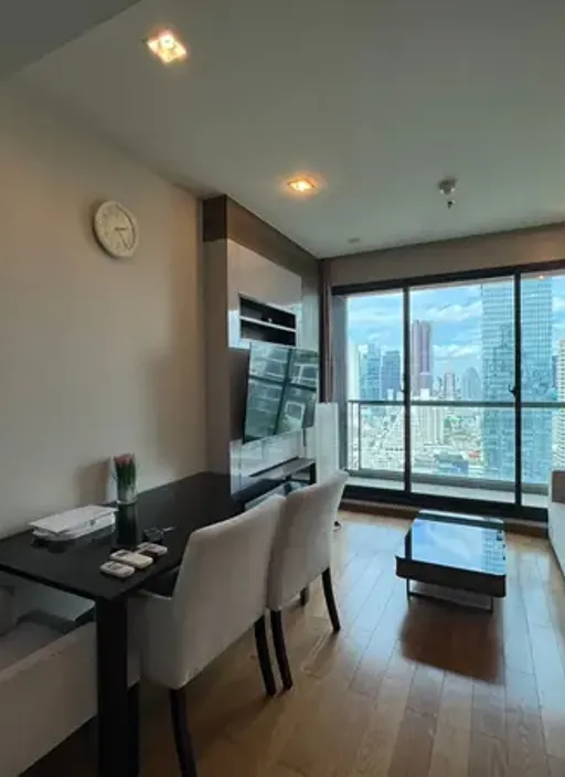 Living room of the 2-bedroom condo (66 sq.m.) at The Address Sathorn