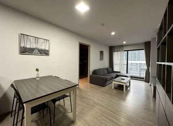 Living room (view 2) of the 2-bedroom condo (80.03 sq.m.) at Rhythm Ekkamai
