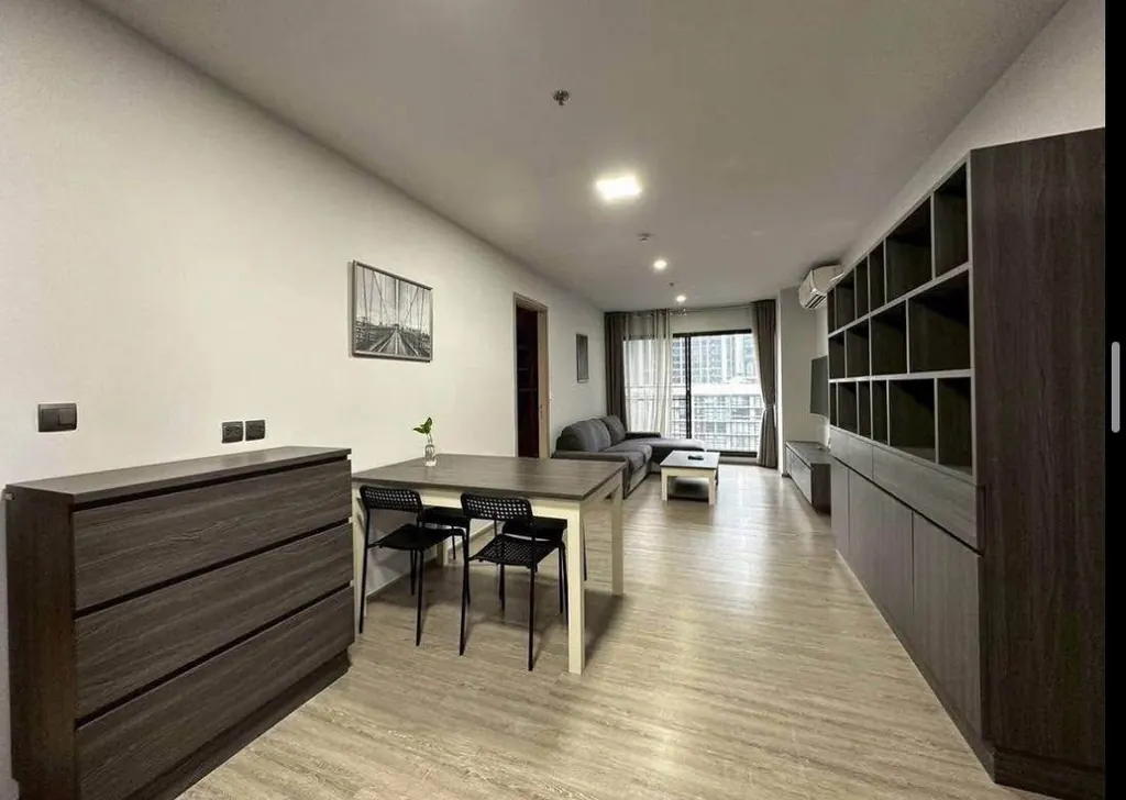 Living room (view 3) of the 2-bedroom condo (80.03 sq.m.) at Rhythm Ekkamai