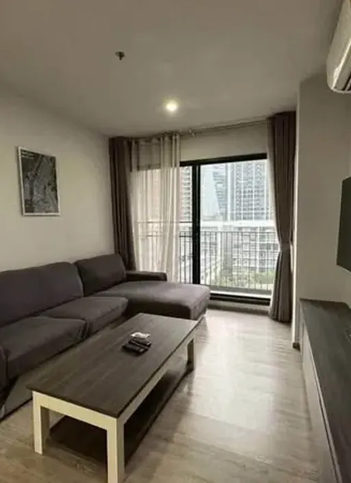 Living room of the 2-bedroom condo (80.03 sq.m.) at Rhythm Ekkamai