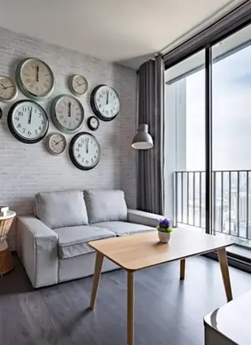 Living room of the 1-bedroom condo (33 sq.m.) at The Edge Sukhumvit 23