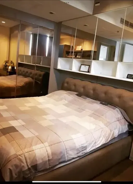 Living room of the 2-bedroom condo (66 sq.m.) at Nara 9 by Eastern Star