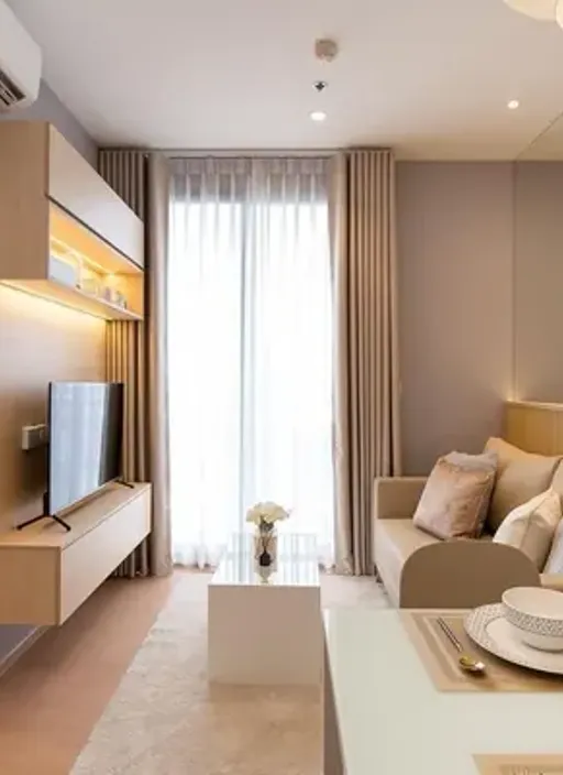 Living room of the 1-bedroom condo (34 sq.m.) at Maru Ekkamai 2