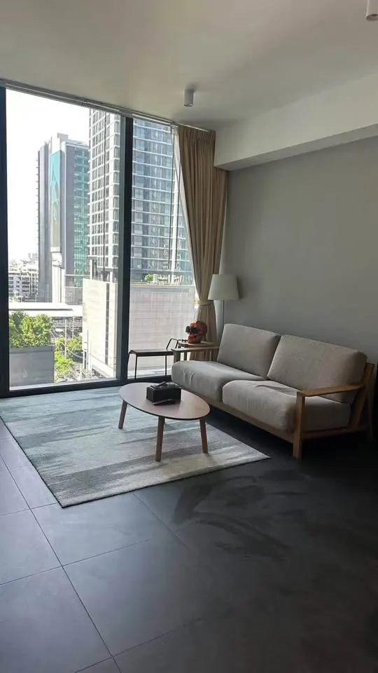Living room (view 2) of the 2-bedroom condo (72.5 sq.m.) at Tait Sathorn 12