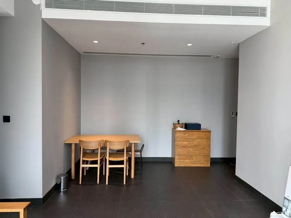 Living room (view 3) of the 2-bedroom condo (72.5 sq.m.) at Tait Sathorn 12