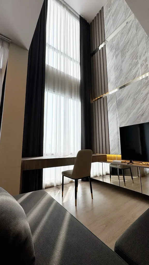 Wohnzimmer (Ansicht 2) der 1-Zimmer-Eigentumswohnung (59 m²) im Bangkok Horizon Sathorn
