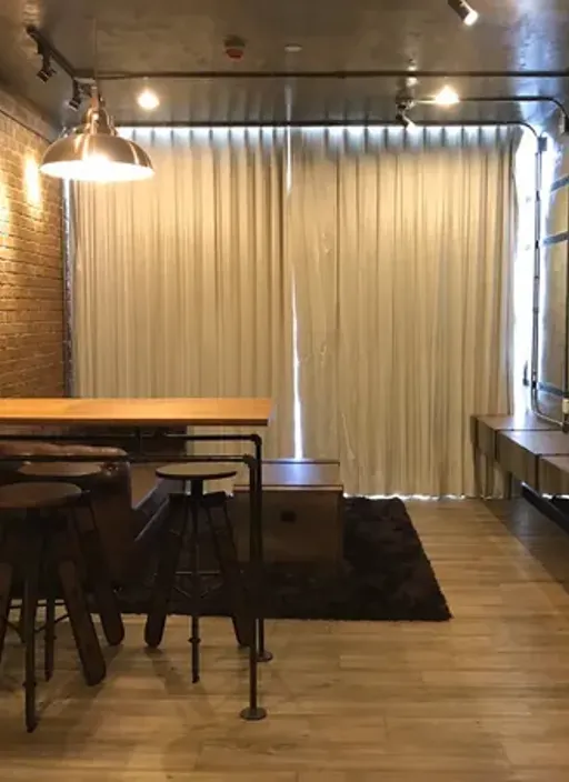 Living room of the 2-bedroom condo (78.5 sq.m.) at The Room Sathorn
