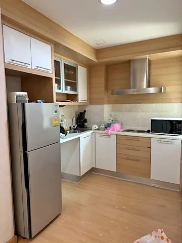 Living room of the 1-bedroom condo (56 sq.m.) at The Bangkok Narathiwas