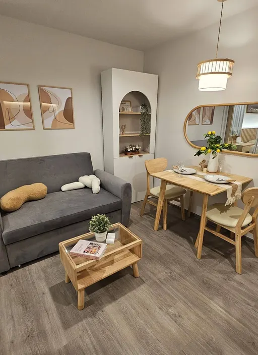 Living room of the 1-bedroom condo (28 sq.m.) at Regent Home Bangna