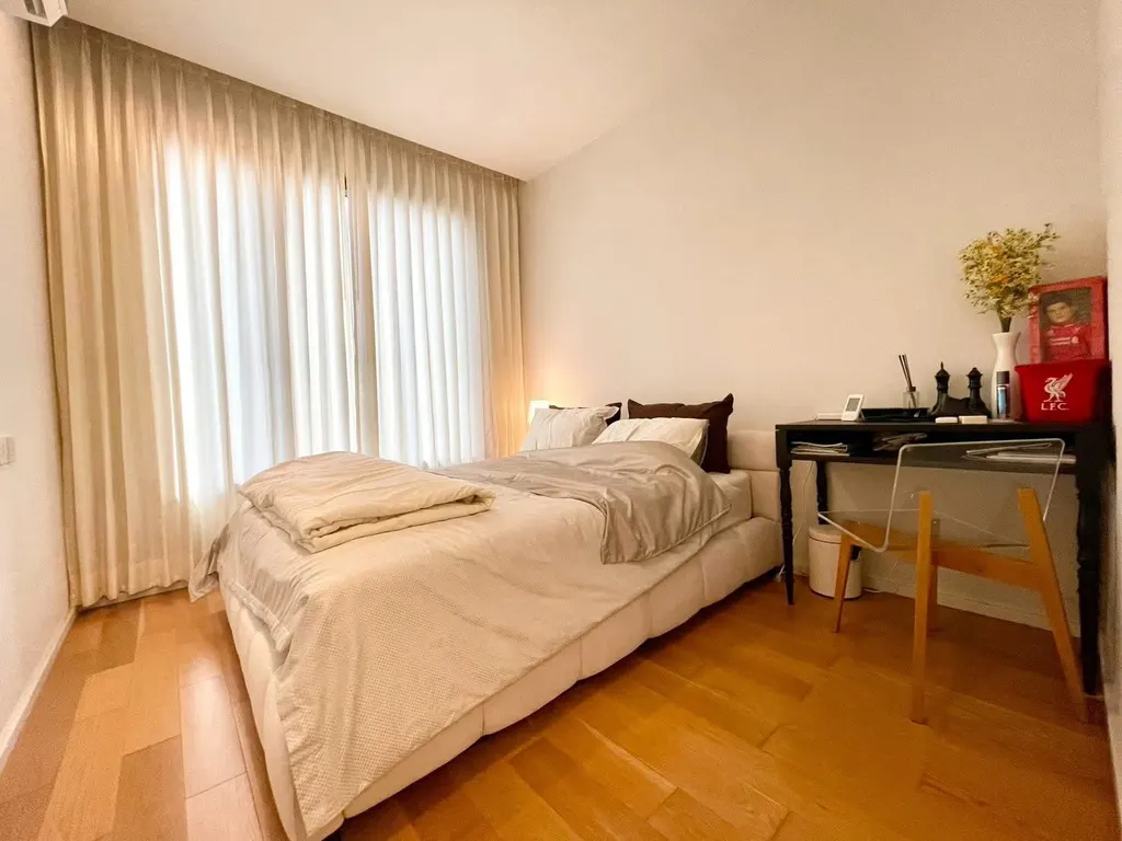Bedroom of the 1-bedroom condo (37.4 sq.m.) at M Ladprao