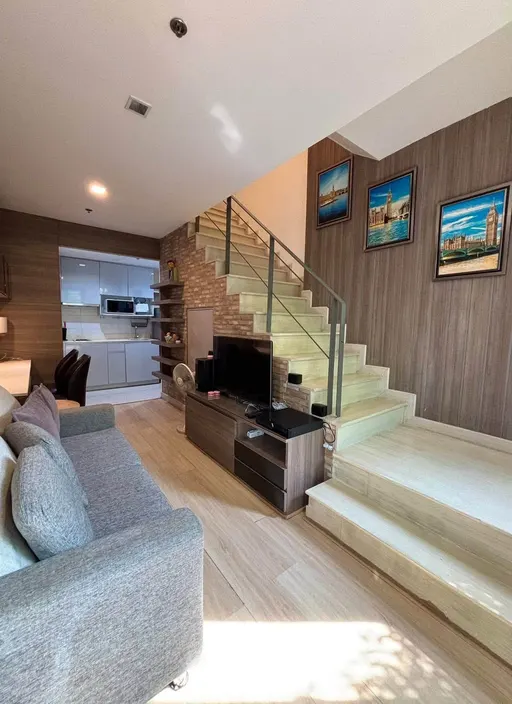 Living room of the 1-bedroom condo (43 sq.m.) at Ideo Mobi Sukhumvit 81