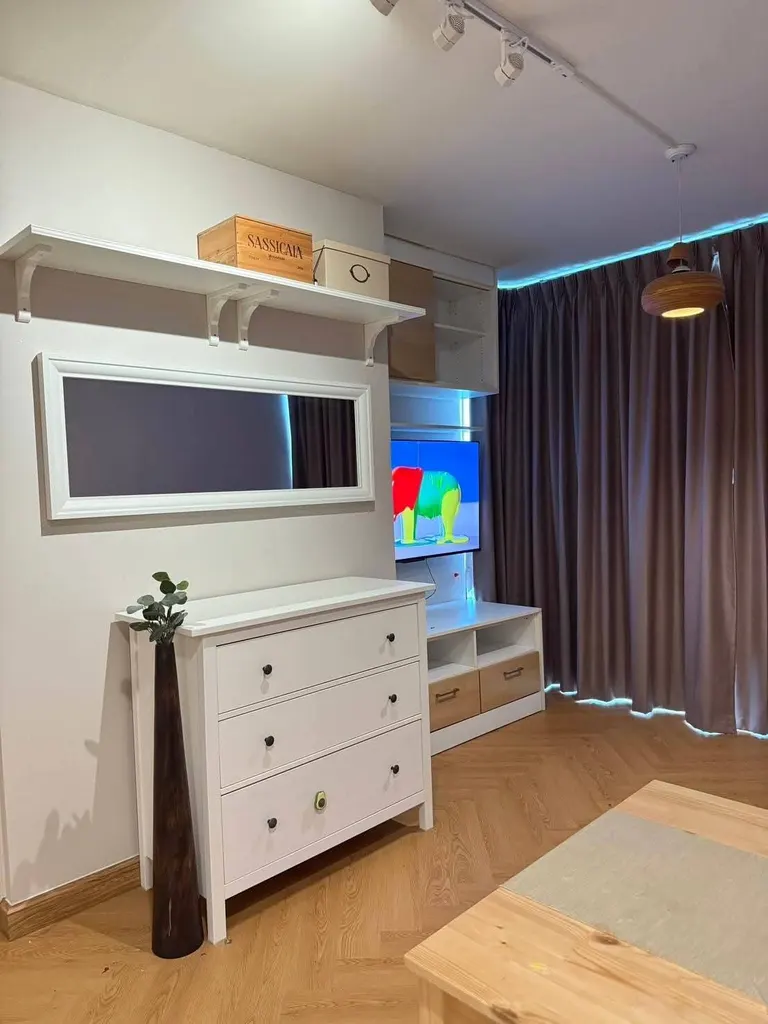 Living room (view 2) of the 2-bedroom condo (58 sq.m.) at The IRIS Rama 9 - Srinagarindra