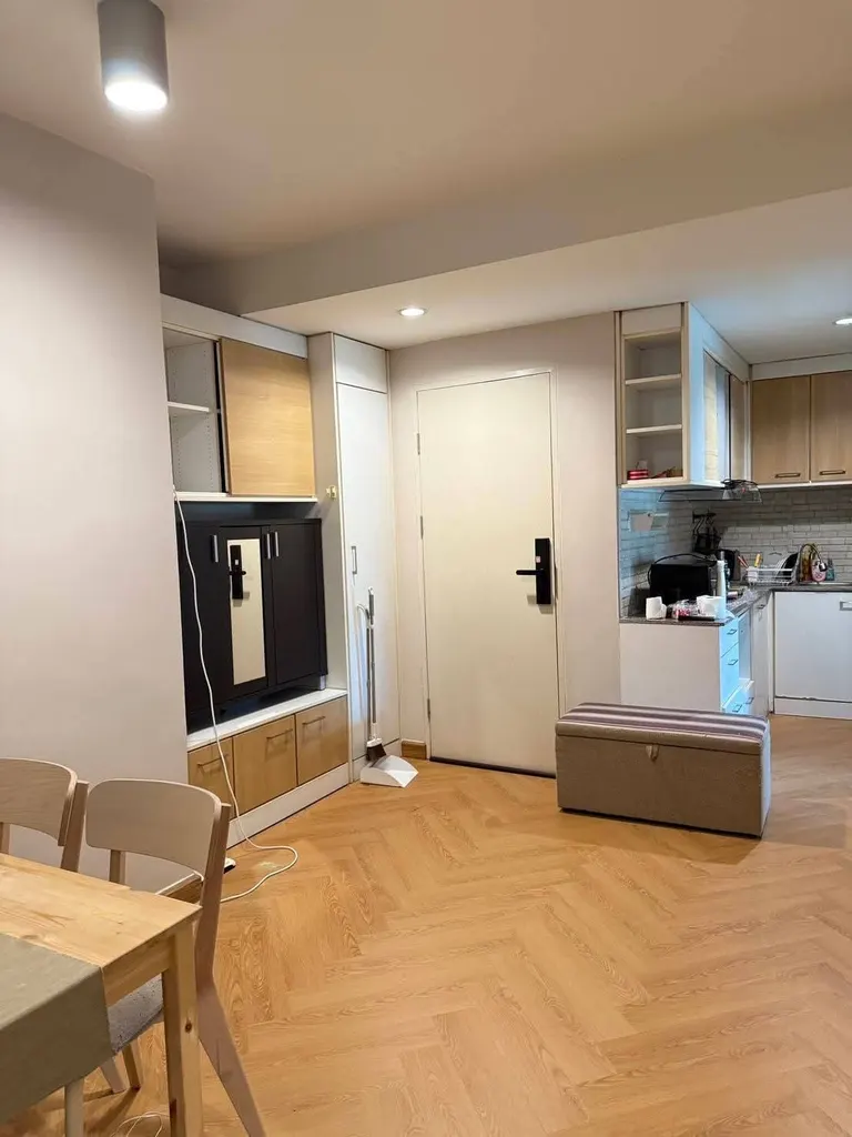 Living room (view 4) of the 2-bedroom condo (58 sq.m.) at The IRIS Rama 9 - Srinagarindra