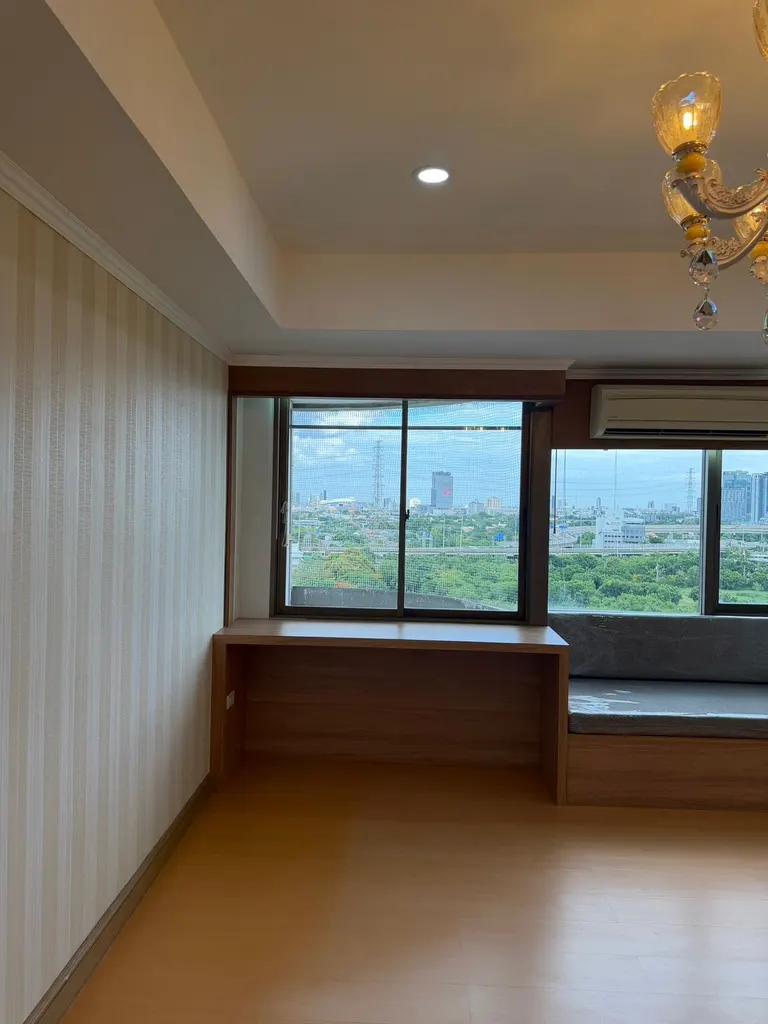 Living room (view 2) of the 1-bedroom condo (33.52 sq.m.) at Royal Nine Residence