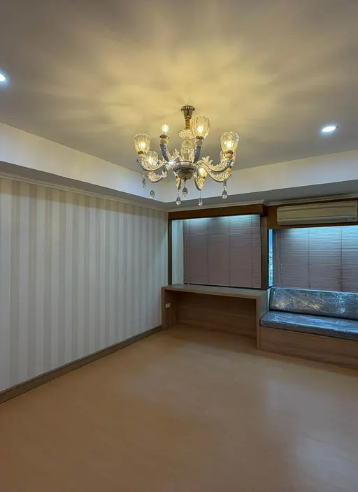 Living room of the 1-bedroom condo (33.52 sq.m.) at Royal Nine Residence