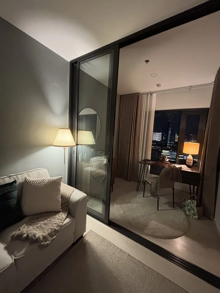Living room (view 3) of the 1-bedroom condo (35.33 sq.m.) at Life Charoennakhon-Sathorn