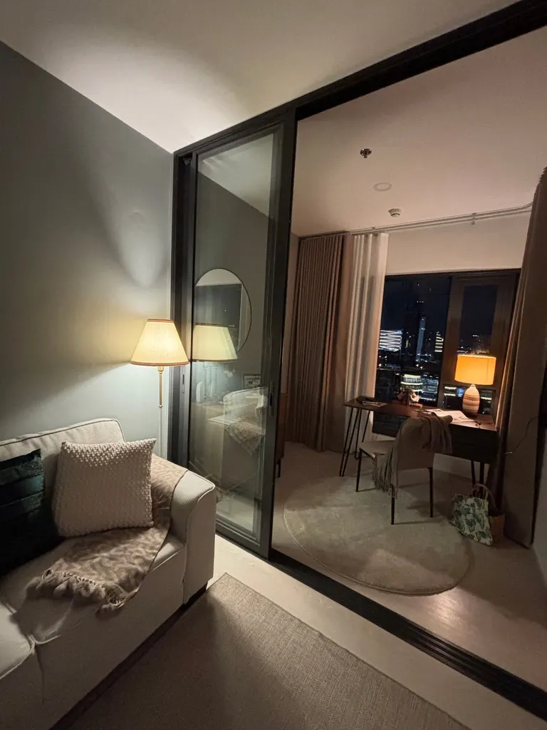 Living room (view 3) of the 1-bedroom condo (35.33 sq.m.) at Life Charoennakhon-Sathorn