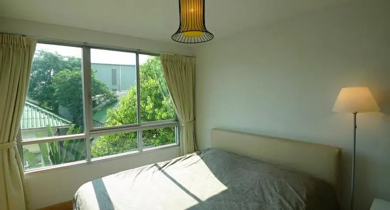Plus 38 Hip Condominium 1房公寓（50平方米）的卧室