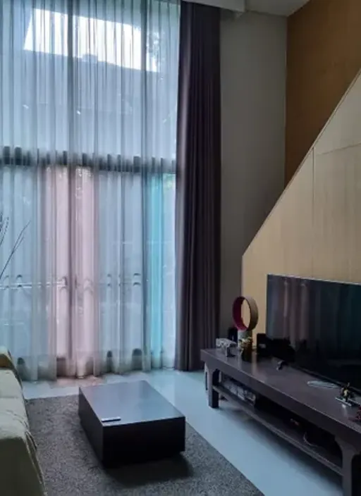 Living room of the 1-bedroom condo (68.12 sq.m.) at Siamese Thirty Nine